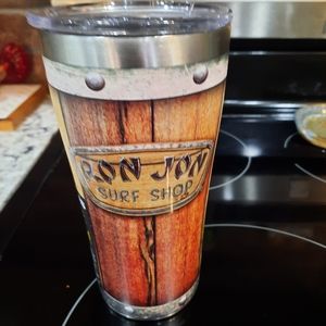Stainless steele tervis tumbler with lid. (NEW).